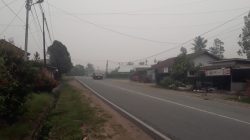 SINTANG DALAM KEPUNGAN KABUT ASAP